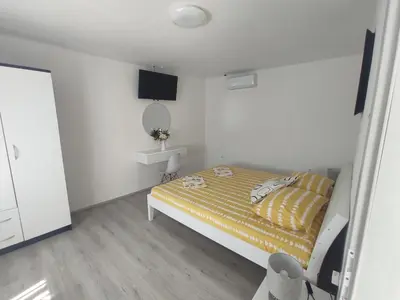Krevet ili kreveti u jedinici u objektu Vacation house Luce