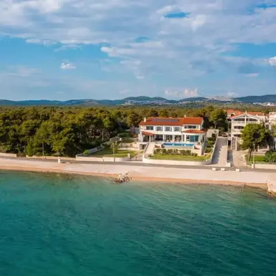 Luxury villa Sea Whisper steps from beach with indoor & outdoor pools near Šibenik
