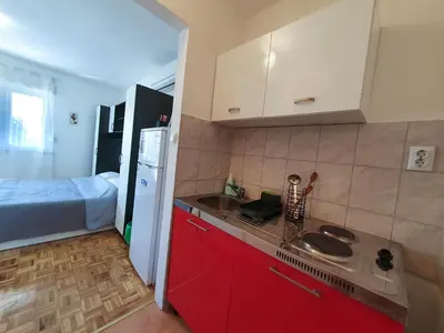 Kuhinja ili čajna kuhinja u objektu Apartments and Rooms Jengic