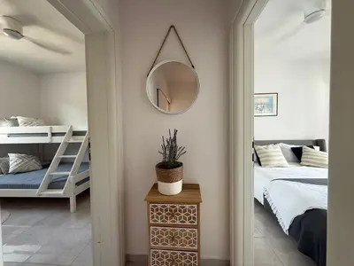 Krevet ili kreveti u jedinici u objektu SEASPRAY APARTMENTS TISNO