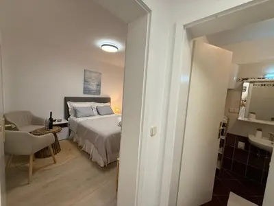 Krevet ili kreveti u jedinici u objektu SEASPRAY APARTMENTS TISNO