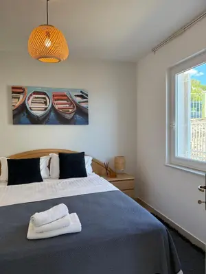 Krevet ili kreveti u jedinici u objektu SEASPRAY APARTMENTS TISNO