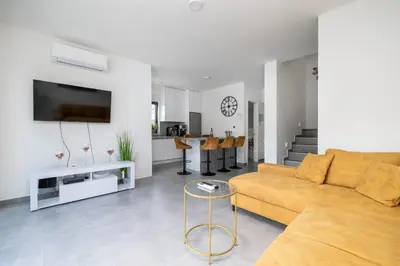 TV i/ili zabavni centar u objektu Premium Holiday home VILA VIDA with Pool