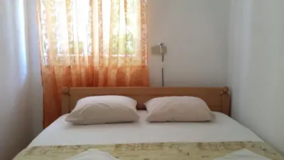 Krevet ili kreveti u jedinici u objektu Apartments Sanda Tribunj