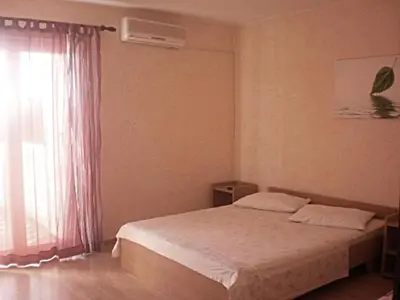 Krevet ili kreveti u jedinici u objektu Apartments & Rooms Tony