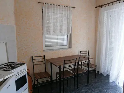 Kuhinja ili čajna kuhinja u objektu Apartments & Rooms Tony