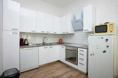 Kuhinja ili čajna kuhinja u objektu Apartments by the sea Sibenik - 21816
