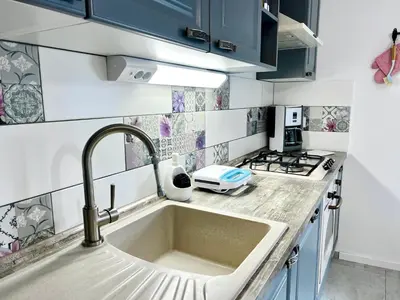 Kuhinja ili čajna kuhinja u objektu Sunny Apartment