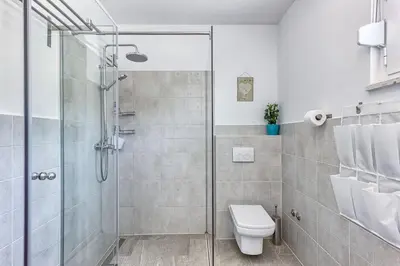 Kupaonica u objektu Villa La Perla