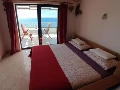 Krevet ili kreveti u jedinici u objektu Apartments by the sea Murter - 22397