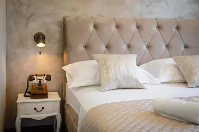 Krevet ili kreveti u jedinici u objektu Villa Cavalleria Rusticana with heated pool and vineyard