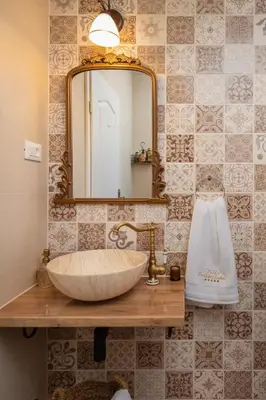 Kupaonica u objektu Villa Cavalleria Rusticana with heated pool and vineyard