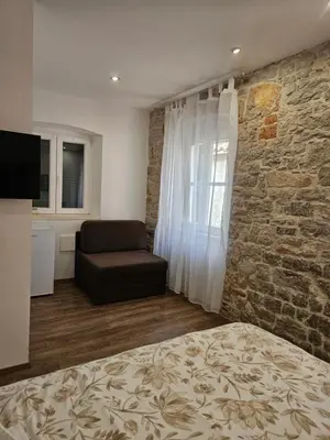 TV i/ili zabavni centar u objektu Sebenico Luxury Rooms 2