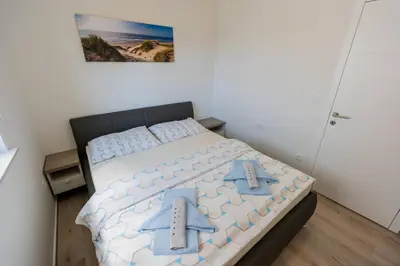 Krevet ili kreveti u jedinici u objektu Three-Bedroom Premium Holiday Home Atmosfera with Private Pool&Sauna
