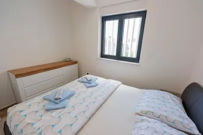 Krevet ili kreveti u jedinici u objektu Three-Bedroom Premium Holiday Home Atmosfera with Private Pool&Sauna