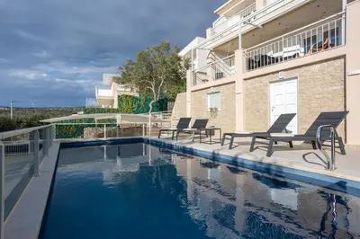 Bazen u objektu Villa Sea Touch - beachfront, with a heated pool ili u blizini