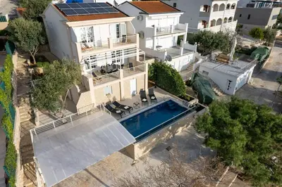 Bazen u objektu Villa Sea Touch - beachfront, with a heated pool ili u blizini