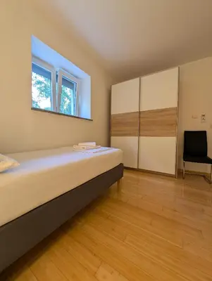 Krevet ili kreveti u jedinici u objektu APARTMAN 1 Istočna Gomilica