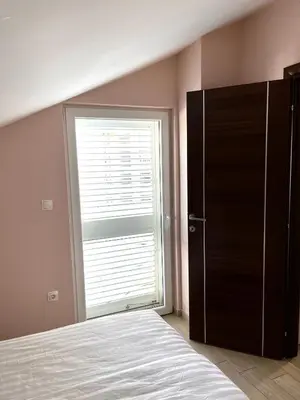 Krevet ili kreveti u jedinici u objektu The Sun Terrace Apartment Rogoznica
