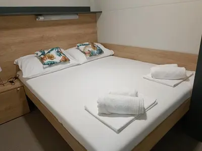 Krevet ili kreveti u jedinici u objektu Mobile Homes Pirovac with 2 shared Pools