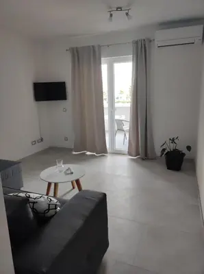 TV i/ili zabavni centar u objektu Villa Sunshine