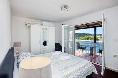 Krevet ili kreveti u jedinici u objektu Apartments by the sea Jezera, Murter - 23192