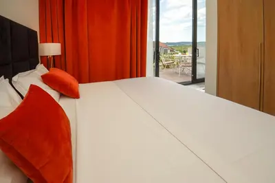 Krevet ili kreveti u jedinici u objektu MEDITERANA Art Deco Resort