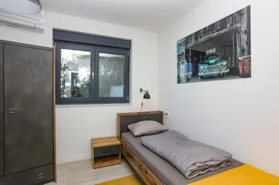 Krevet ili kreveti u jedinici u objektu Family-friendly apartments with swimming pool Murter - 22942