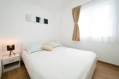 Krevet ili kreveti u jedinici u objektu Apartments Piškulić