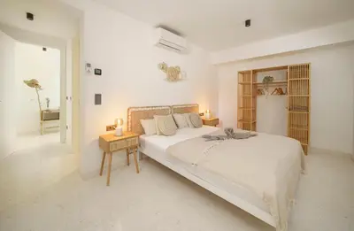 Krevet ili kreveti u jedinici u objektu Exklusives Strandapartment mit Parkplatz & direktem Zugang zum Meer