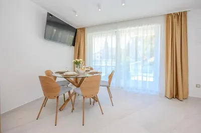 TV i/ili zabavni centar u objektu Villa Aqua Residence