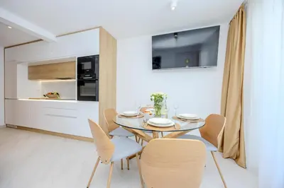 TV i/ili zabavni centar u objektu Villa Aqua Residence