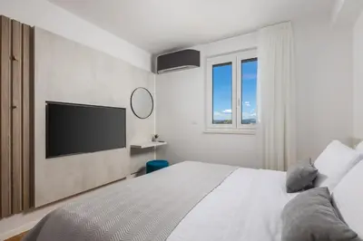 Krevet ili kreveti u jedinici u objektu Luxury apartment La Mer with private pool and garden