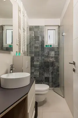 Kupaonica u objektu Luxury apartment La Mer with private pool and garden