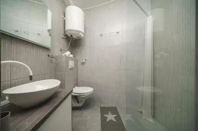 Kupaonica u objektu Apartments Dobrenić