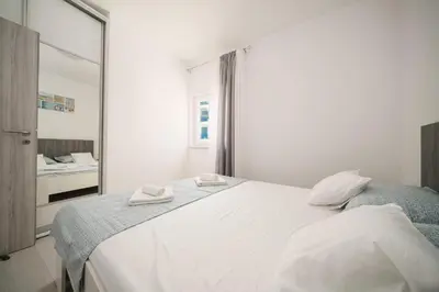 Krevet ili kreveti u jedinici u objektu Apartments Dobrenić