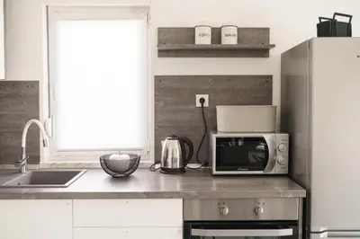 Kuhinja ili čajna kuhinja u objektu Apartments Dobrenić