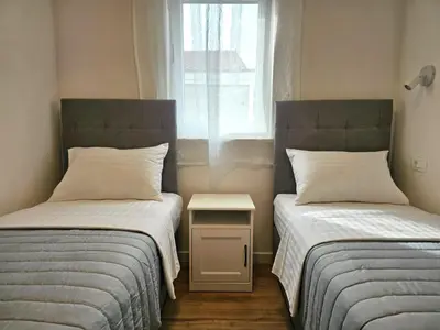 Krevet ili kreveti u jedinici u objektu Apartments Miamare 2