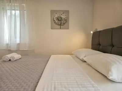 Krevet ili kreveti u jedinici u objektu Apartments Miamare 2