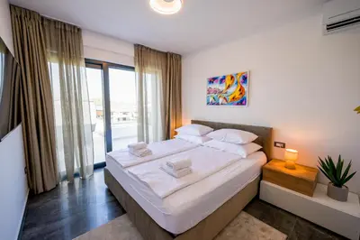 Krevet ili kreveti u jedinici u objektu Penthouse apartment ReNikS