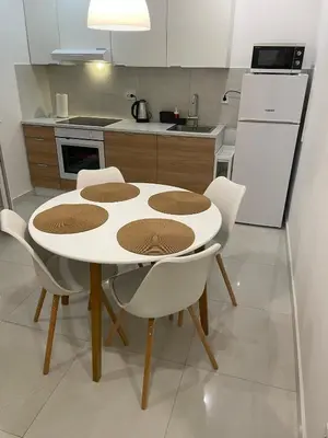 Kuhinja ili čajna kuhinja u objektu Bougainvillea Sea view apartment