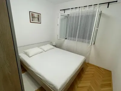 Krevet ili kreveti u jedinici u objektu Bougainvillea Sea view apartment