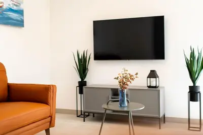 TV i/ili zabavni centar u objektu Holiday home Val