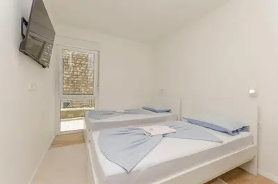 Krevet ili kreveti u jedinici u objektu Apartment Adriatic with pool