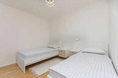 Krevet ili kreveti u jedinici u objektu Apartments Adriatic