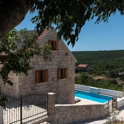 Stone house Grgo with heated swimming pool and spa