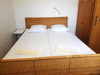Krevet ili kreveti u jedinici u objektu Apartments by the sea Rogoznica - 23439