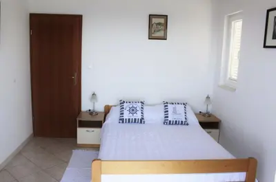 Krevet ili kreveti u jedinici u objektu Apartments Kristina - B