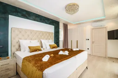 Krevet ili kreveti u jedinici u objektu Villa Golden Lion