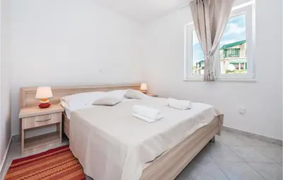 Krevet ili kreveti u jedinici u objektu Apartment Grebastica Lxxxviii